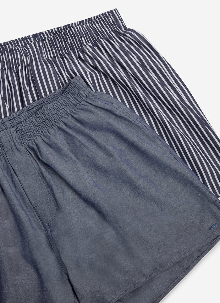 A close-up of the Percival 2-Pack Boxers, showing the detail of the navy and striped cotton fabric and waistbands.
