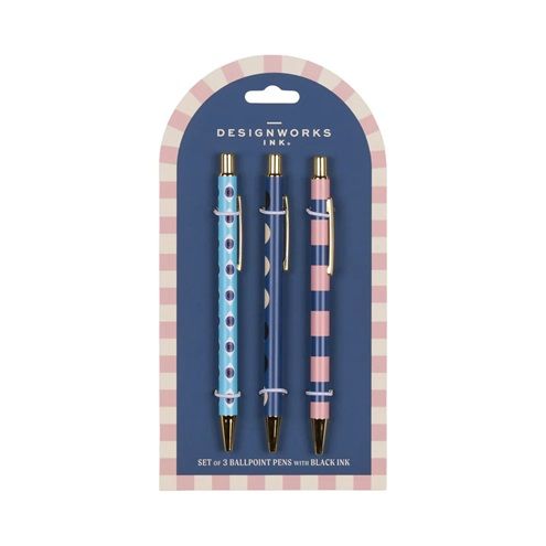 Three decorative ballpoint pens in blue and pink with eye, moon, and stripe patterns