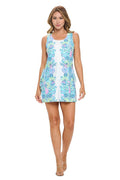 Woman wearing a floral dress on a white background
