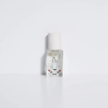 Clear eau de parfum bottle with frosted cap and illustrated label, spray top