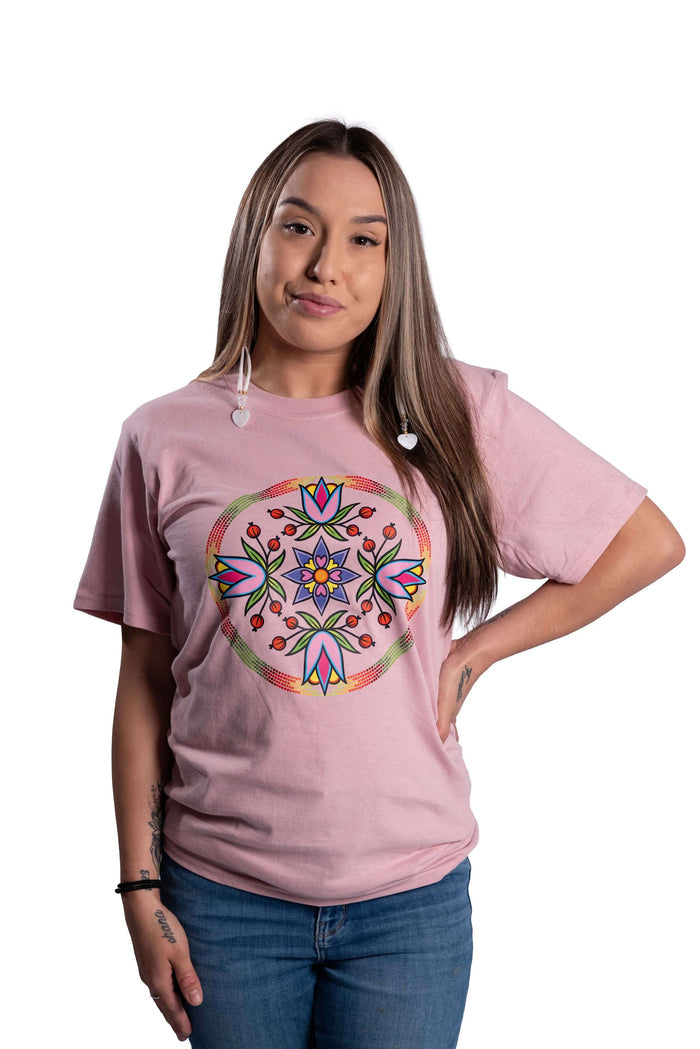Woman wearing a pink Beaded Petal Wheel t-shirt with colourful mandala design front view