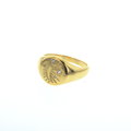 Gold-tone waterproof ring with engraved oval face and three diamond-like stones