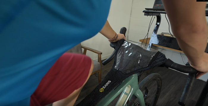 Saris Sweat Guard protecting bike frame from corrosive sweat during indoor training