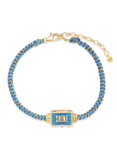 Blue braided cord spinner bracelet with gold chain and rectangular SHINE charm