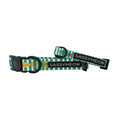 Two green and white striped adjustable Cat Collar - Portofino by Sassy Woof, featuring black buckles, rings, playful food and cat-themed patterns, plus a SASSYMEOW label.