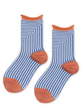Striped crew socks with cornflower blue and orange knit cuff, toe, and heel