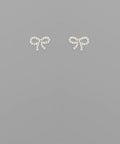 Small crystal ribbon bow stud earrings in gold and silver tones displayed on a neutral background from The Pink Doxie Boutique.