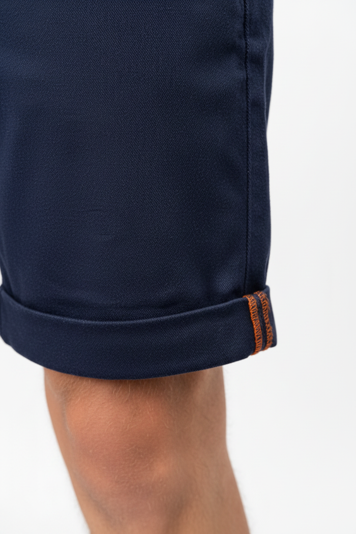Wam Denim Kelden Navy Chino Shorts – turned-up cuff hem with orange accent stitching detail