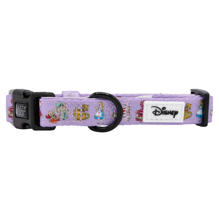 The Sassy Woof Dog Collar - Alice in Wonderland (Purple) features a black plastic buckle, black metal ring, Disney princess images, and the Disney logo on a white patch—perfect for fans who want a magical accessory for their pup.