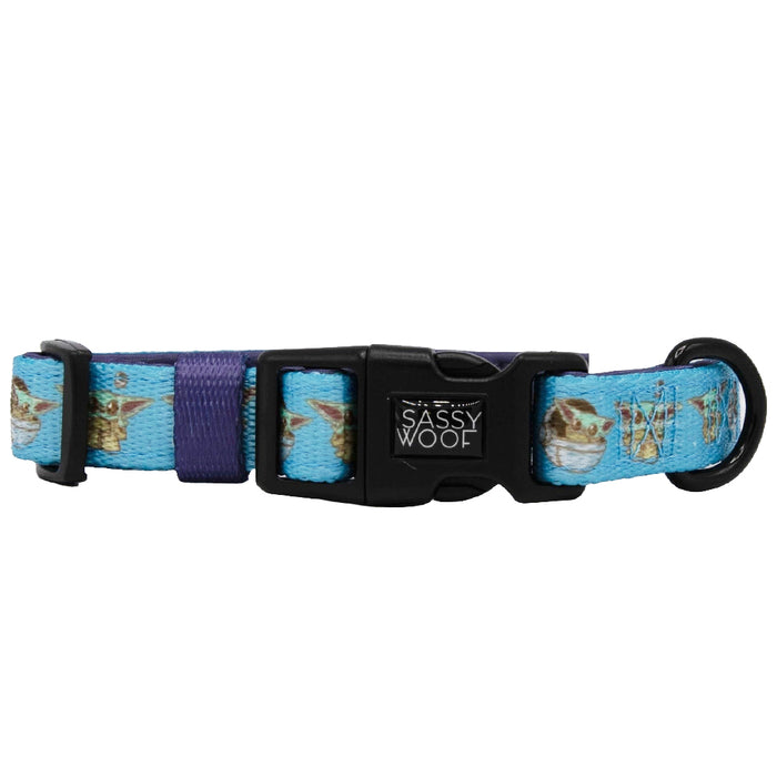 The Sassy Woof Dog Collar - STAR WARS™ The Mandalorian™ is a blue adjustable collar featuring Baby Yoda images, a black buckle, black adjustment slider, and a metal ring for leash attachment.