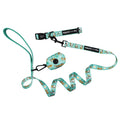 A vibrant turquoise dog collar three-piece bundle from Sassy Woof’s Peanuts™ Road Tripping collection, featuring Snoopy and Woodstock with charming white daisies, displayed on a white background—the perfect adventure accessories for stylish pups on the go.