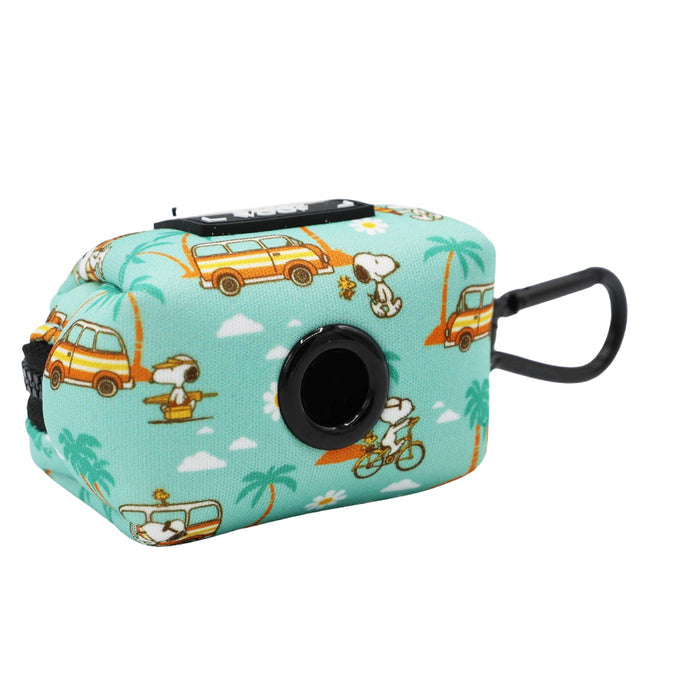 A compact teal pouch with black dispenser and loop from the Sassy Woof Dog Four Piece Bundle - Peanuts™ Road Tripping, featuring Snoopy surfing, cycling, and driving a van with palm trees and clouds.