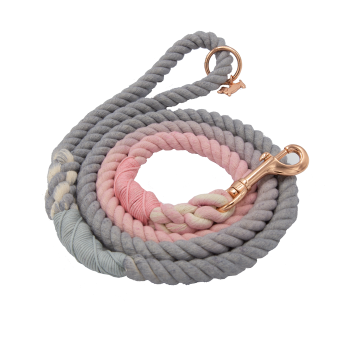 The Sassy Woof Dog Rope Leash - Daydream features hand-crafted ombre rope in pastel grey, pink, and light blue, finished with a stylish rose gold metal clasp and ring.