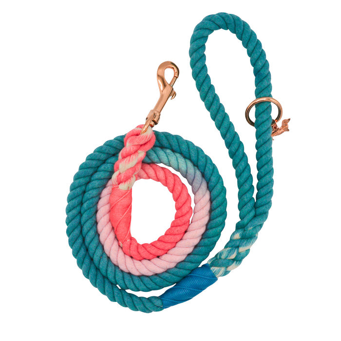 The Sassy Woof Dog Rope Leash - Jack & Jill features hand-crafted ombre colors in teal, blue, pink, and coral, plus rose gold hardware with a circular ring near the handle.
