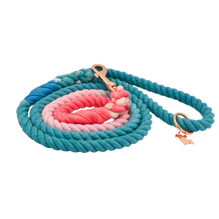 The Sassy Woof Dog Rope Leash - Jack & Jill is a hand-crafted ombre leash in blue, pink, and coral with rose gold hardware, including a metal clip, ring, and a cute dog-shaped charm.