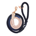 The Dog Rope Leash - Moonlight by Sassy Woof features hand-crafted twisted sections in navy blue, pink, white, and indigo tie-dye for a colorful pattern, finished with a sleek gold clip for extra style.