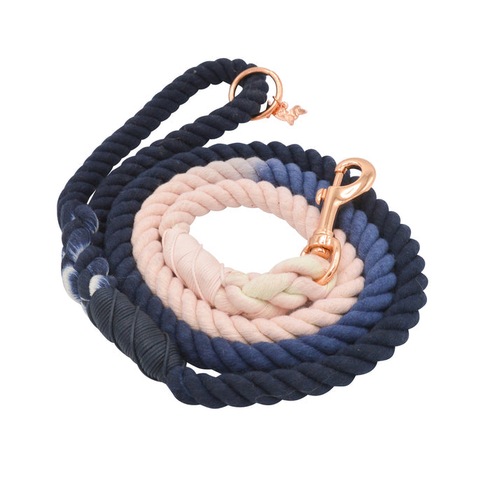 The Sassy Woof Dog Rope Leash - Moonlight is a hand-crafted ombre leash in navy blue, light pink, and cream with rose gold hardware, blending elegant design and function for your pup.