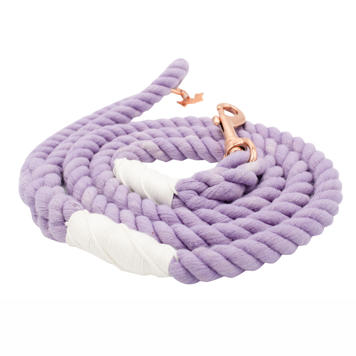 The Sassy Woof Dog Rope Leash - Verona is a coiled lavender cotton leash with white wrapped ends and a rose gold metal clasp, shown on a white background.