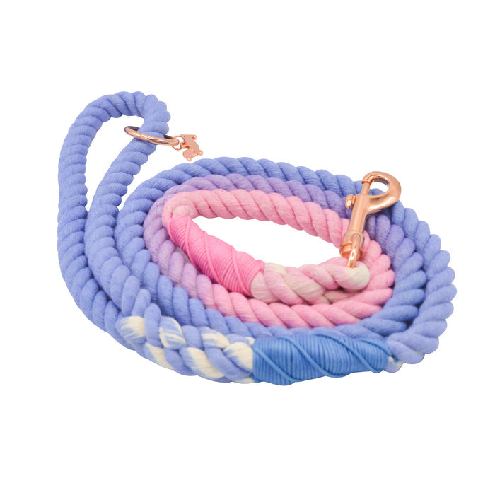 The Sassy Woof Dog Rope Leash - Victoria features a coiled ombre design in blue, purple, pink, and cream with rose gold hardware and a strong metal clasp.