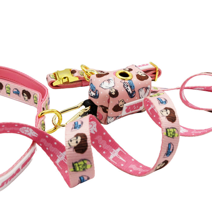 The Sassy Woof Dog Three Piece Bundle – STAR WARS™ Princess Leia features a pink collar, leash, and waste bag holder with cartoon characters, colorful icons, gold hardware, and playful designs for stellar style.