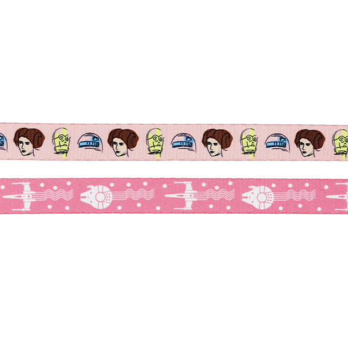 The Sassy Woof Dog Three Piece Bundle - STAR WARS™ Princess Leia features two pink ribbons: one with cartoon princess, droid, and robot heads, and one with white spaceships and stars—ideal for a custom Star Wars dog collar.