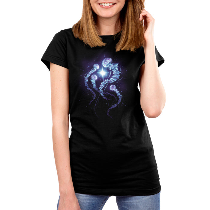 Premium Cotton T-shirt_TeeTurtle black Enchanting Jellyfish apparel featuring a smack of four blue, and purple jellyfish swimming around a bright white light in the deep ocean.