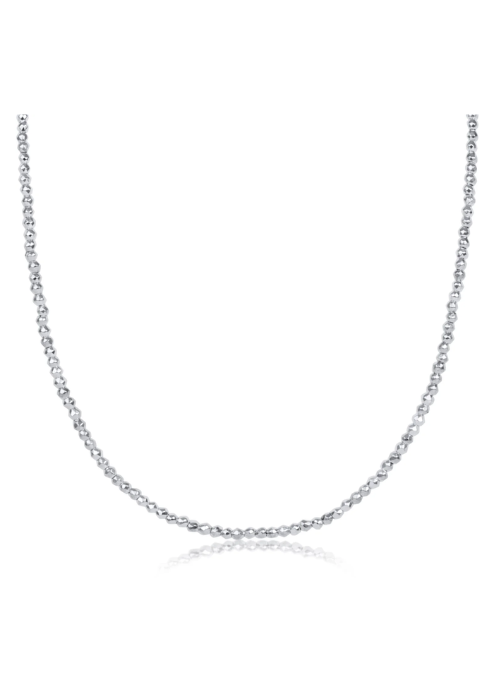 Bright silver beaded choker necklace on a white background