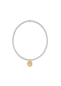 Silver beaded bracelet with a round gold heart charm on a white background