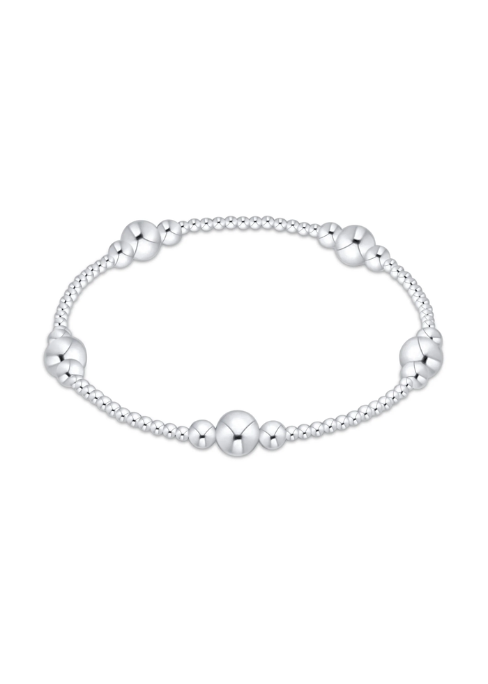 Silver beaded bracelet on a white background