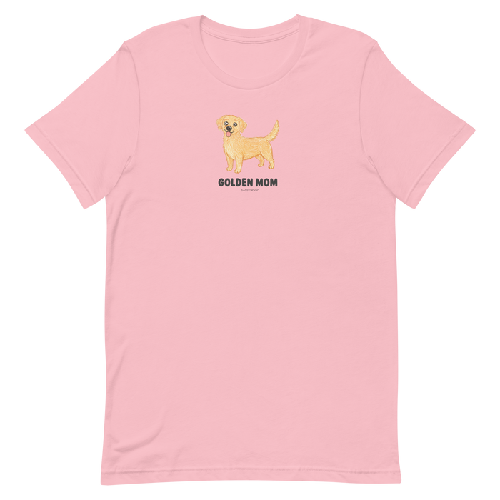 The Golden Mom Tee by Sassy Woof is a light pink unisex dog shirt with a cute golden retriever illustration and bold "GOLDEN MOM" text—an ideal addition to any breed t-shirt collection.