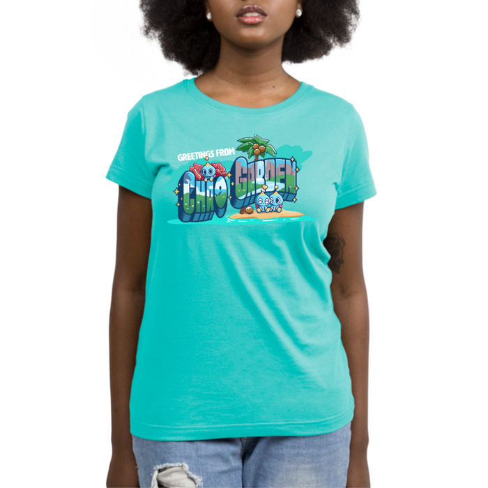Premium Cotton T-shirt_TeeTurtle caribbean blue Greetings from Chao Garden Premium Cotton T-shirt featuring a vintage postcard design with cute little chao guys on an island with a coconut tree. There is text that reads "Greetings from" at the top and below there is a landscape visible in the bubble letters that spell "Chao Garden"