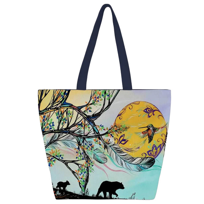 Tote bag with nature-themed design featuring trees, moon, and animals on a white background