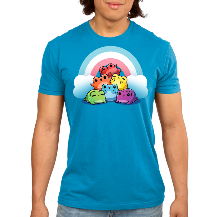 Premium Cotton T-shirt_TeeTurtle cobalt Hoppy Pride Premium Cotton T-shirt featuring a pyramid of happy frogs in the rainbow colors in front of a rainbow with the trans pride colors of light blue, white and pink.