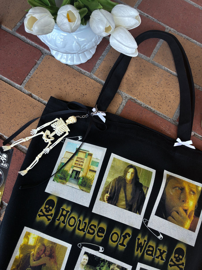 "house of wax" tote bag