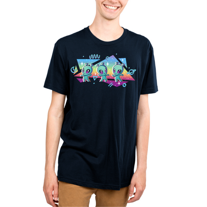 Premium Cotton T-shirt_TeeTurtle navy "Interstellar Pride" Premium Cotton T-shirt featuring three cut aliens dancing in front of geometric shapes filled with a rainbow gradient