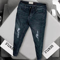 Jet black ripped jeans men UAE outfit style - 2221