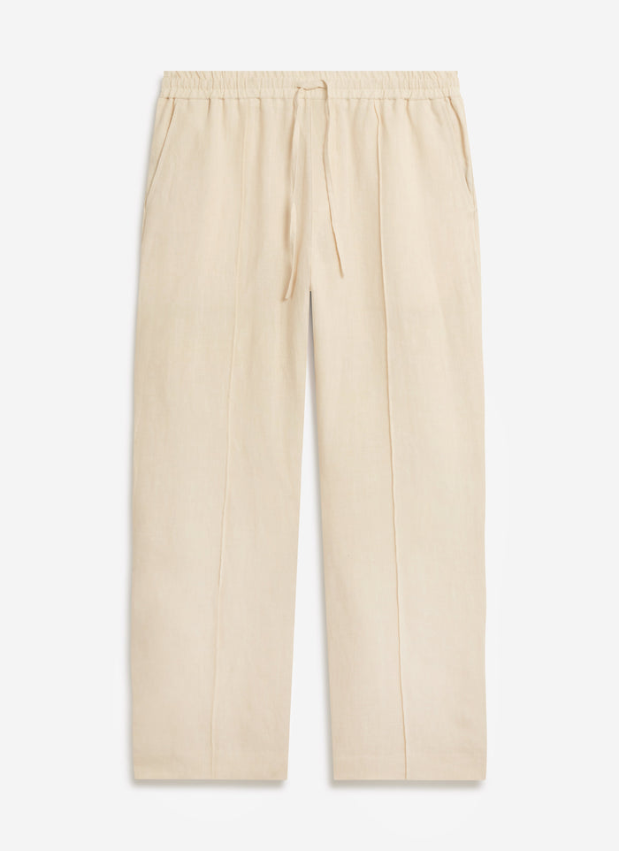 A flat lay of the Percival Lorena Wide Leg Trousers in cream linen, showing the relaxed fit and elasticated drawstring waist.