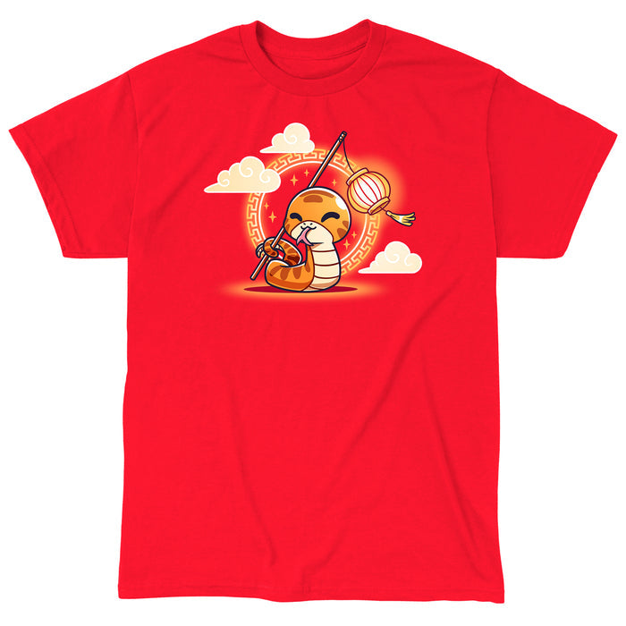 Classic Cotton T-shirt_TeeTurtle red Lunar New Year Snake apparel featuring a snake holding a stick with a lantern at the end with its tail with Lunar New Year elements in the background.