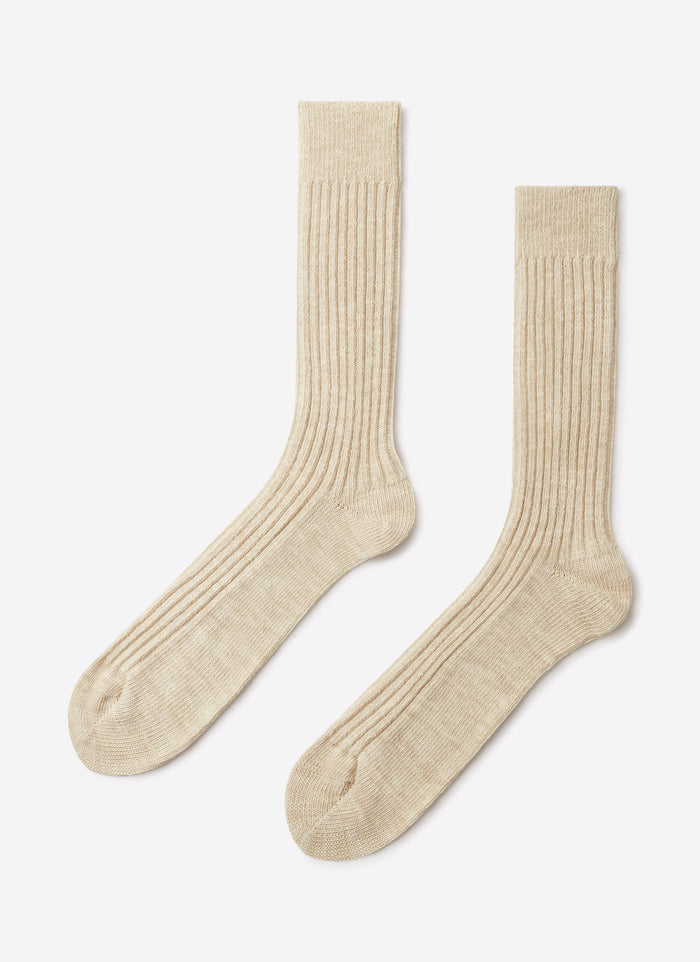 A pair of Percival Marl Socks in Oat, a ribbed cotton-blend style, laid flat against a plain white background.