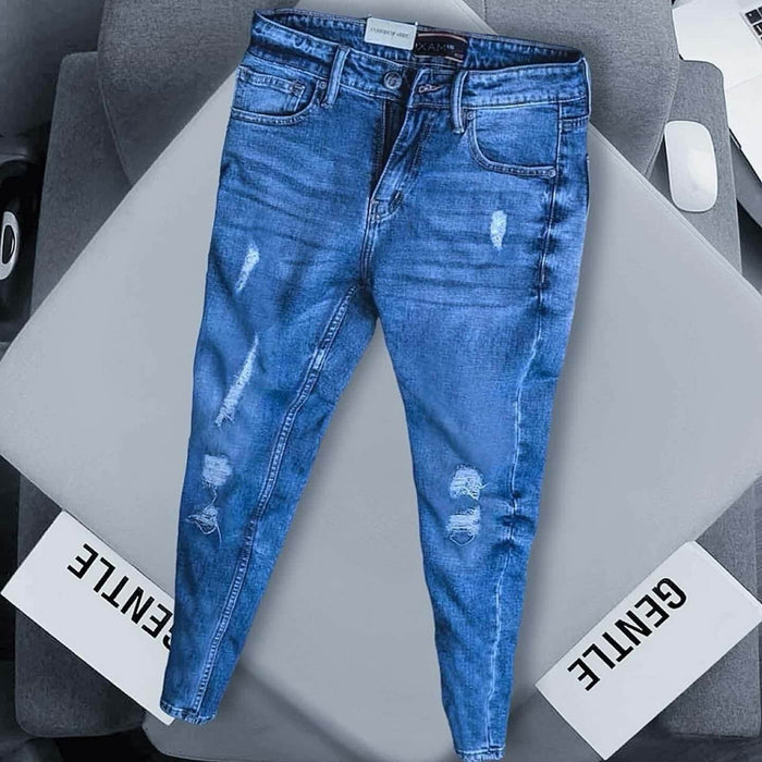 Detail close-up of dynamic distressed denim - 3448