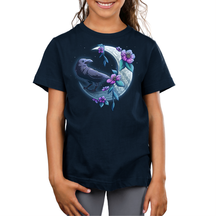 Premium Cotton T-shirt_TeeTurtle navy blue Midnight Perch Premium Cotton T-shirt featuring a raven perched and glowing atop a fancy crescent moon with pink flowers and stars in the background