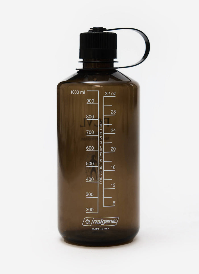 The PCVL Water Bottle from Percival. A 1L Nalgene bottle in brown with measurement markings and custom illustrated artwork.