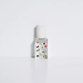 Poom Poom eau de parfum bottle, clear with colorful cartoon print and silver cap