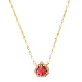 Gold tone chain necklace with round halo pear-cut red gemstone pendant