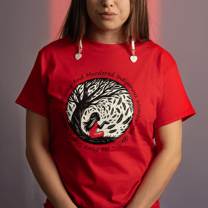 "Model wearing Red Dress Day 2025 t-shirt with Indigenous design