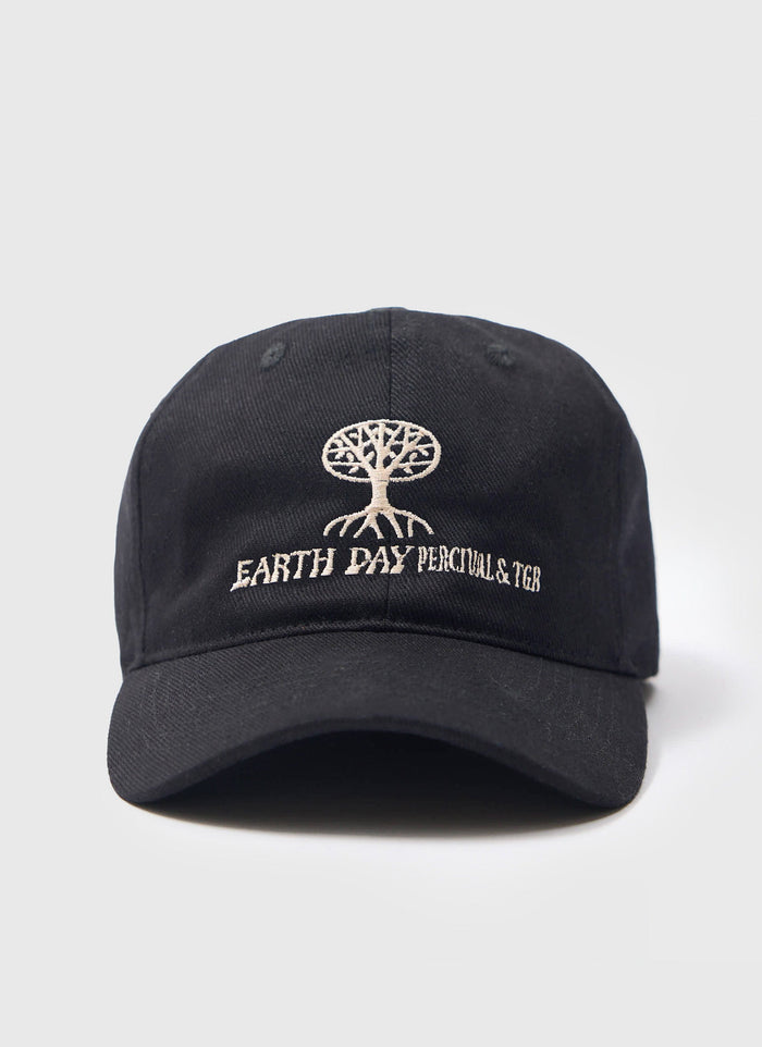 The Percival x The Gorilla Brand regular cap in black, showing the detailed 'Earth Day' embroidery on the front.