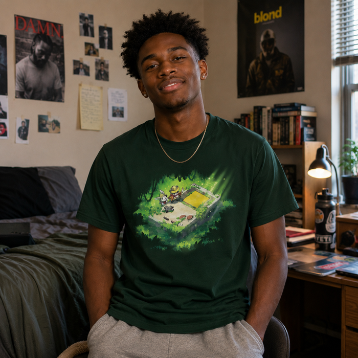 Men's Premium T-Shirt_TeeTurtle forest green Relics of the Past apparel featuring a panda and a bunny wearing explorer outfits climbing over a gigantic handheld video gaming device that’s overgrown with plants in a jungle.