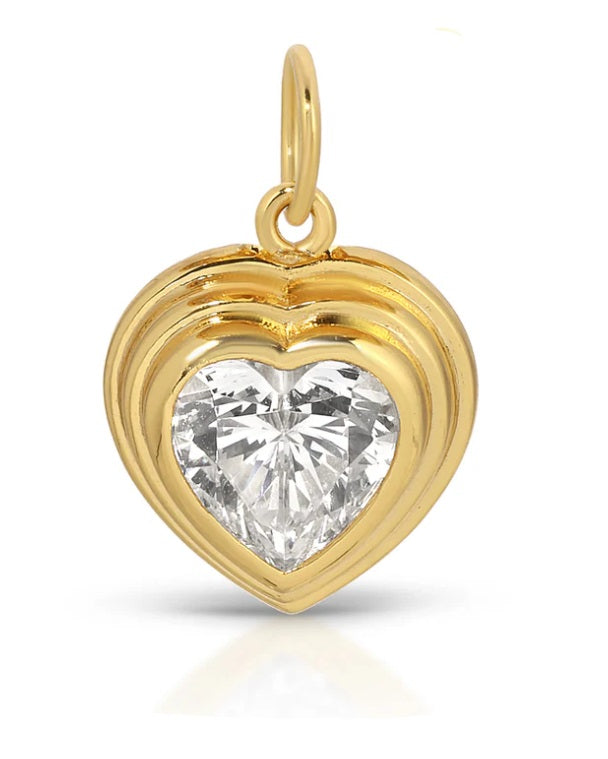 Gold-tone heart-shaped charm with faceted simulated diamond centerpiece and loop