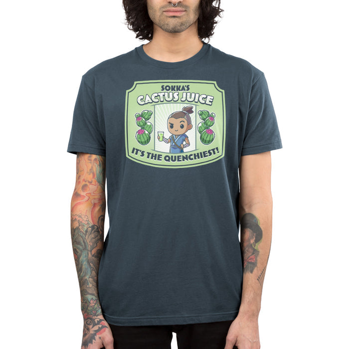 Premium Cotton T-shirt_TeeTurtle denim blue Sokka's Cactus Juice featuring a label with a drawing of two cactuses, Sokka from Avatar: The Last Airbender holding a glass full of green liquid, and text that says "Sokka's Cactus Juice" at the top and "It's the quenchiest!" at the bottom.