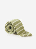 Percival Stripe Linen Tie in Sage Marl, rolled up on a white background.